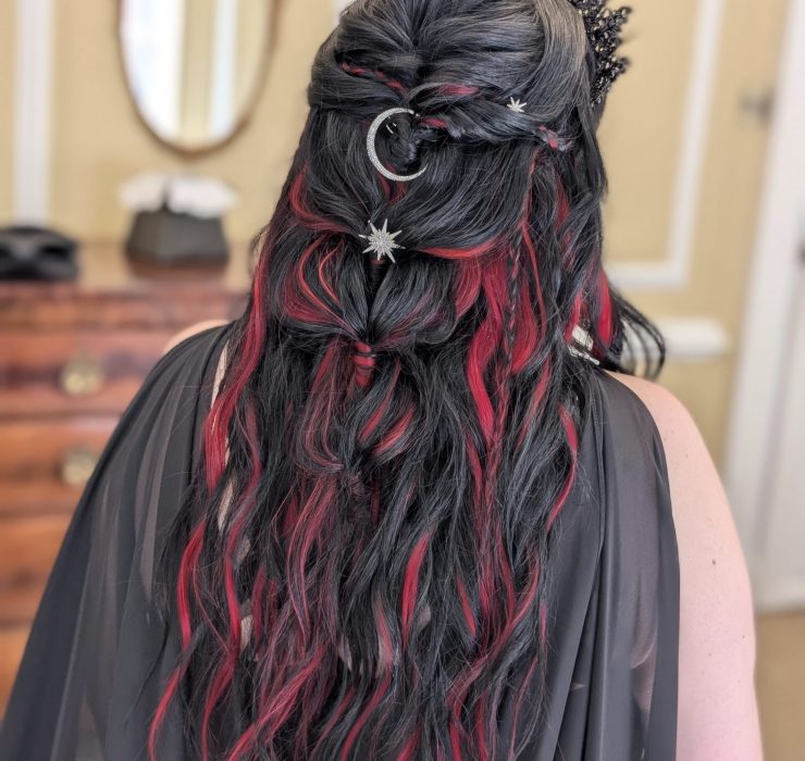 alternative gothic hairstyling with red and black hair. alt bride